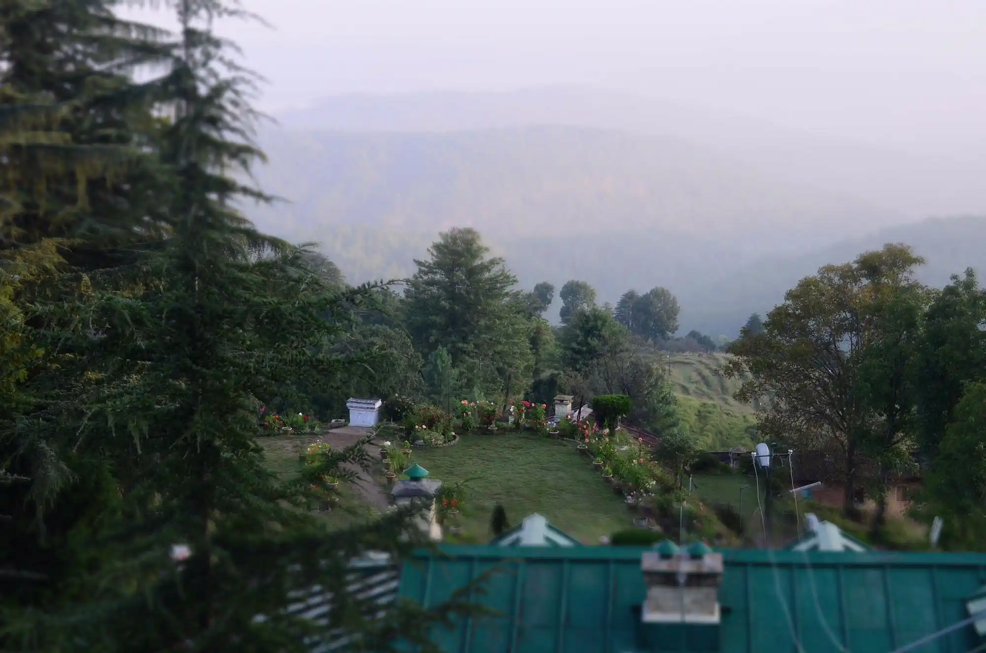 Historic PWD inspection bungalow in Mukteshwar offering stunning views of the Nanda Devi peak